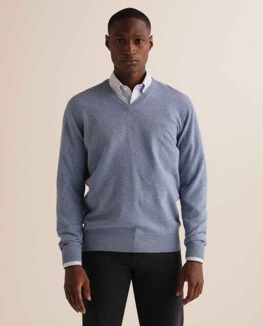 Camisola de malha lambswool azul com decote em bico