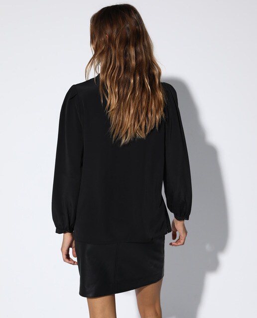 Blusa com colarinho de camisa