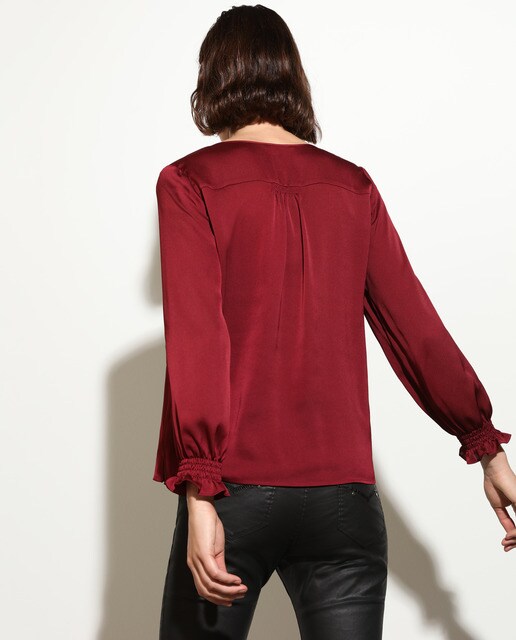 Blusa lisa com manga comprida