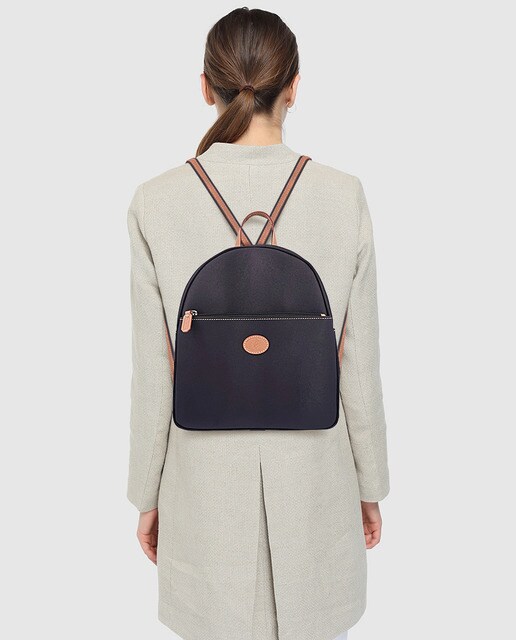 Mochila média de lona e pele de bovino preta com fecho-éclair
