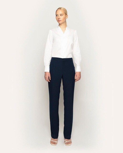 Camisa de mujer Mirto en color blanco y cuello chimenea