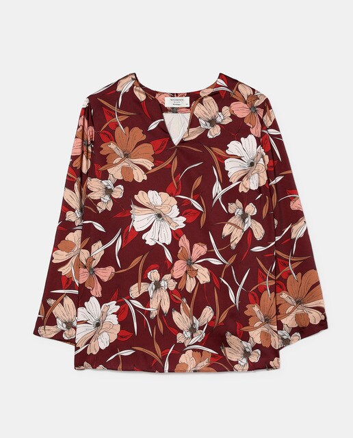 Blusa de mulher tamanhos grandes com estampado floral e decote em bico
