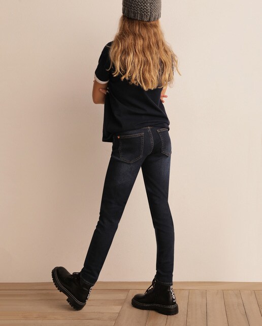 Jeans azuis de cintura subida