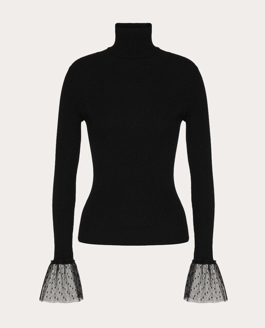 Jersey cuello alto con volantes