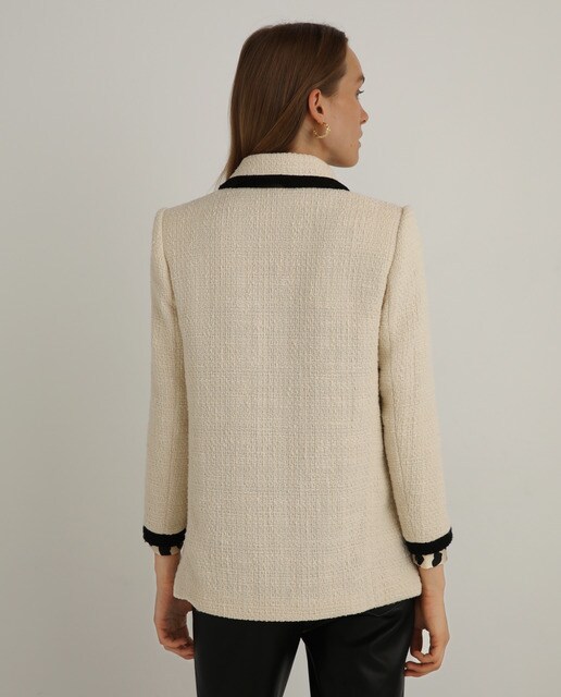 Chaqueta tweed bolsillos