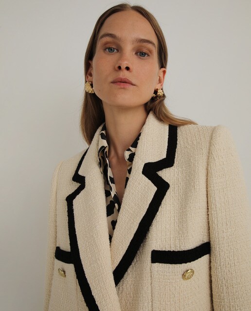 Chaqueta tweed bolsillos