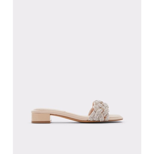 Imagen 0 de Sandalias planas de mujer en textil de color beige y detalle de brillantes
