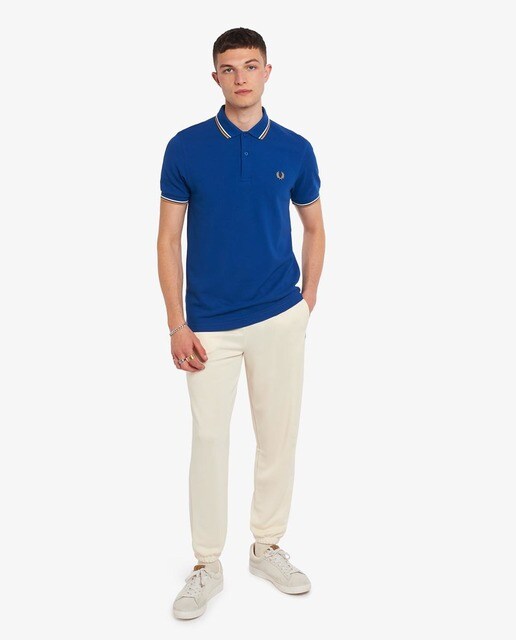 Polo de piqué de hombre azul de manga corta · FRED PERRY · El Corte Inglés