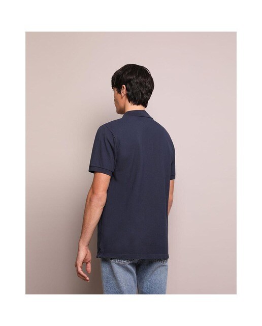 Polo de piqué de hombre en azul de manga corta · Scalpers · El Corte Inglés