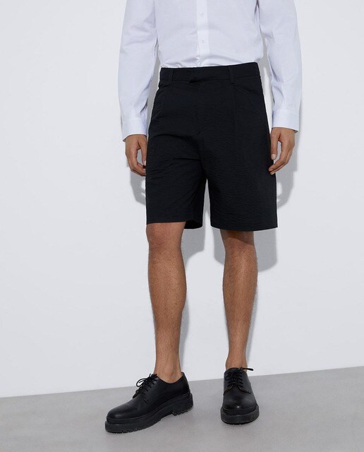 Bermuda de hombre lisa en color negro · Adolfo Dominguez · El Corte Inglés