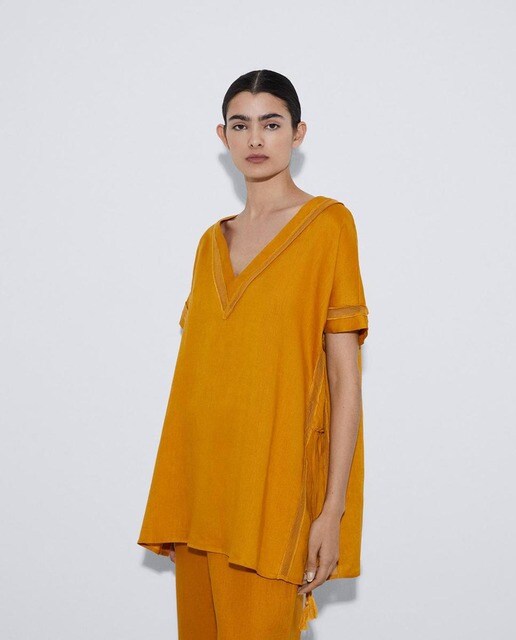Camisa de mujer lisa en color amarillo · Adolfo Dominguez · El Corte Inglés