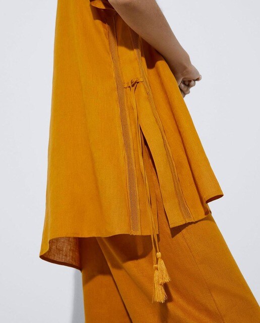 Camisa de mujer lisa en color amarillo · Adolfo Dominguez · El Corte Inglés