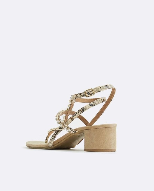 Sandalias de tacón de mujer con tachuelas en beige · Cuplé · El Corte Inglés