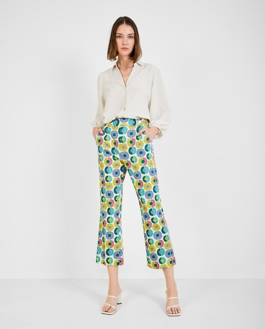 Pantalón de mujer de campana con estampado de círculos multicolor · Trucco  · El Corte Inglés