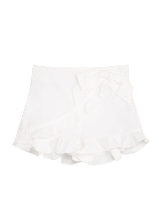 Falda pantalón de niña en blanco con volante · Dadati · El Corte Inglés