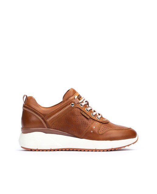 Zapatillas de piel de mujer con cuña y picados en color marrón · Pikolinos  · El Corte Inglés