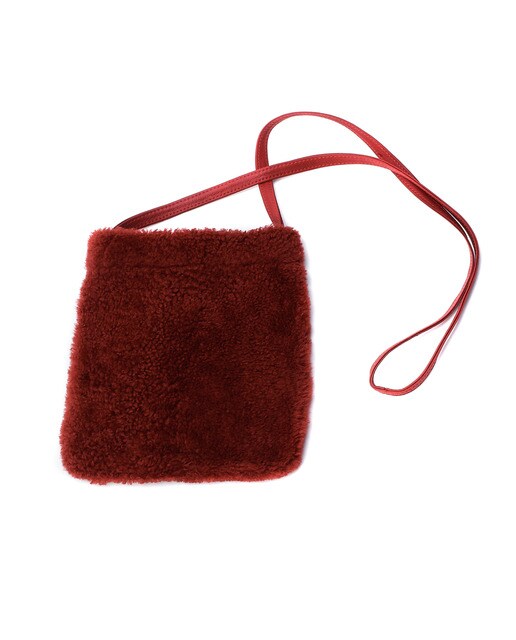Bolso unisex de piel de cordero con pelo rizado color rojo · Coolskins · El  Corte Inglés