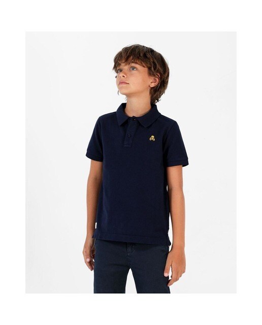 Polo de niño de manga corta en azul marino · Scalpers · El Corte Inglés