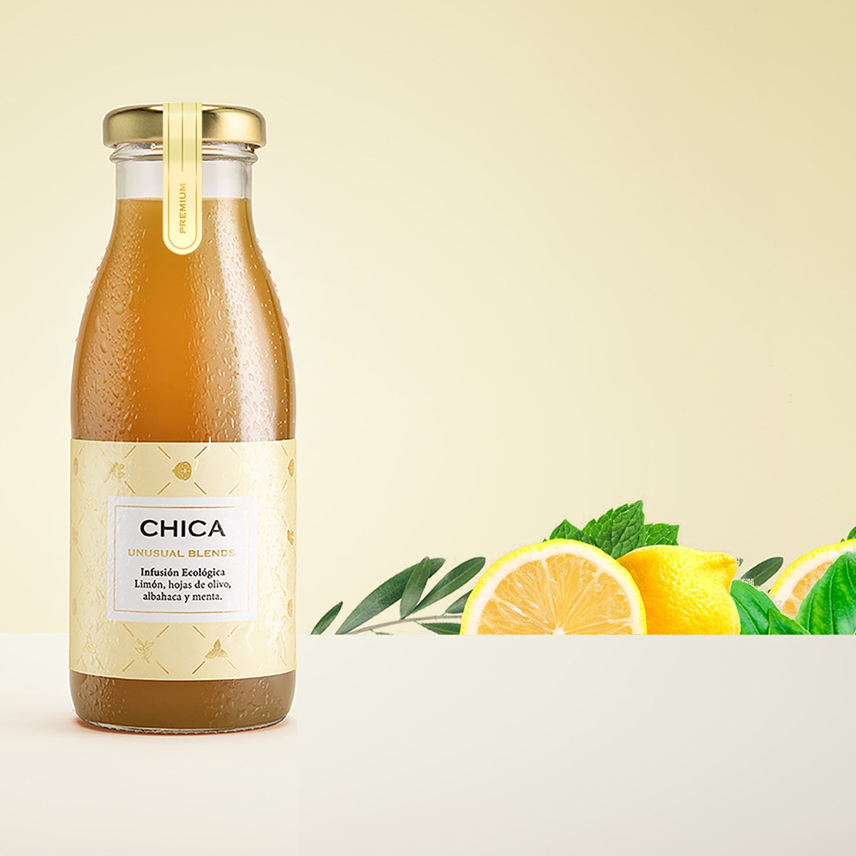 Bebida ecológica infusionada de limón, hojas de olivo, albahaca y menta, sin gluten, Chica 2