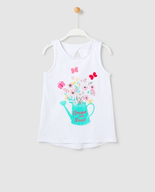 Camiseta de niña blanca con florero