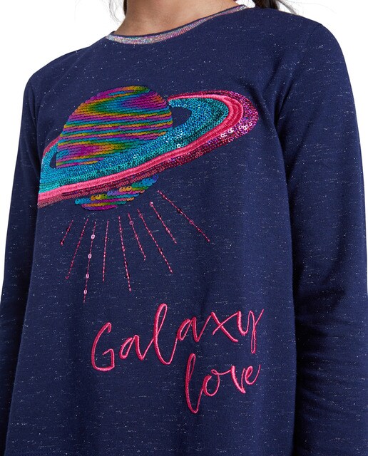 Camiseta de niña azul con planeta de lentejuelas · Desigual Camiseta de manga larga con lentejuelas plateadas DESIGUAL