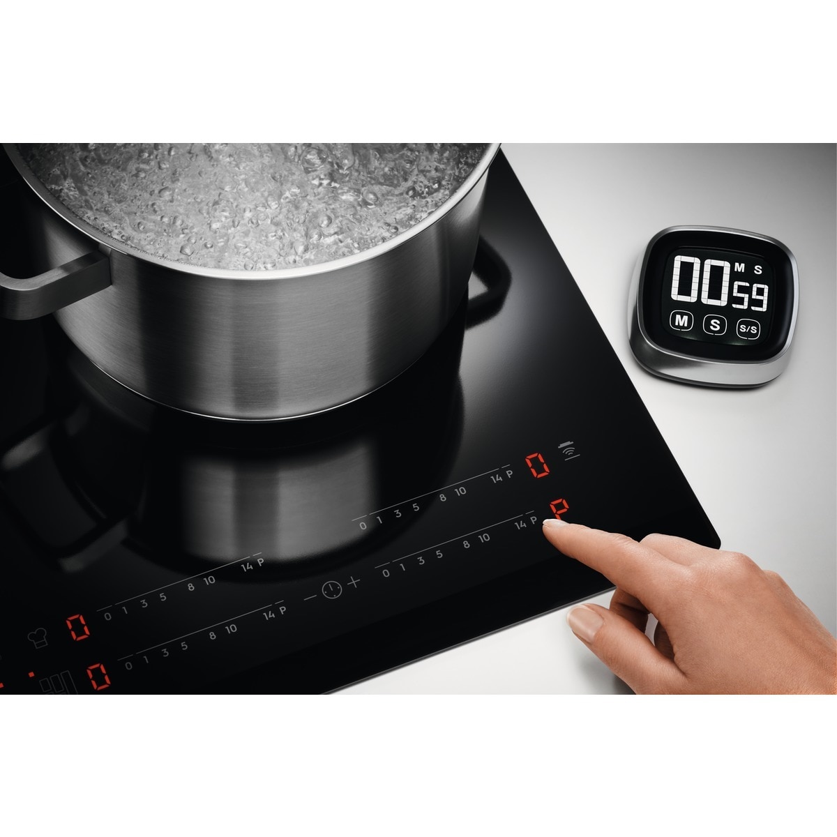 Placa inducción Electrolux con 3 zonas de cocción - EIT60342 Negro-10