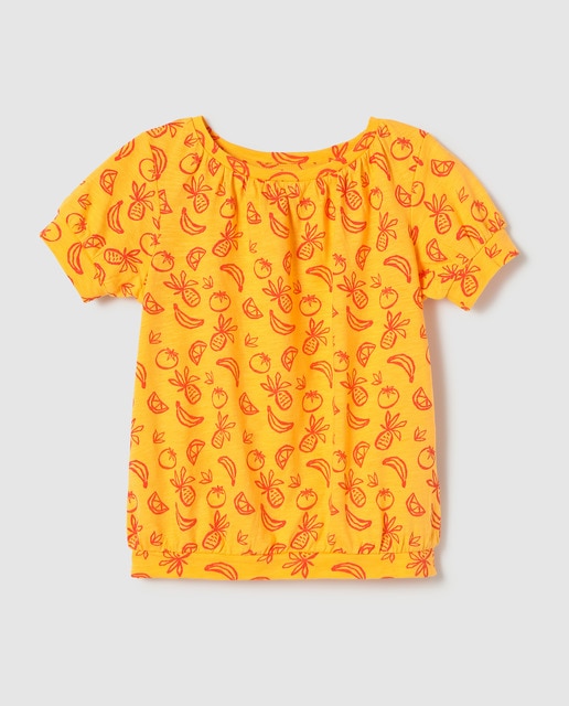 Camiseta de niña naranja con frutas
