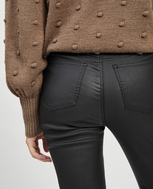 Pantalón de mujer de campana encerado · Object · El Corte Inglés