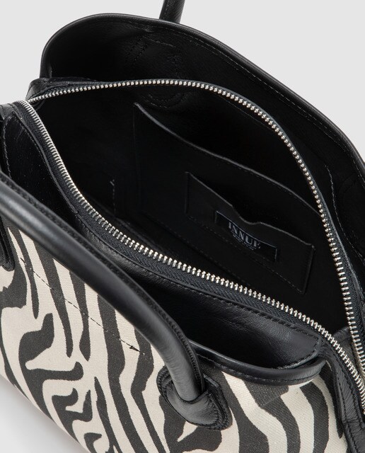 Bolso de mano grande Innue animal print de canvas y piel bicolor · Innue · El  Corte Inglés