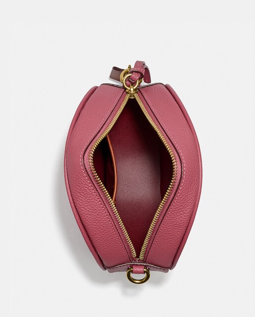 Bandolera mini redonda de mujer Coach de piel en rosa con cremallera · Coach  · El Corte Inglés