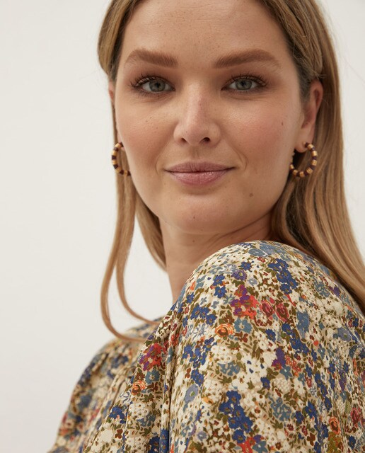 Blusa flores volante bajo · Couchel · El Corte Inglés