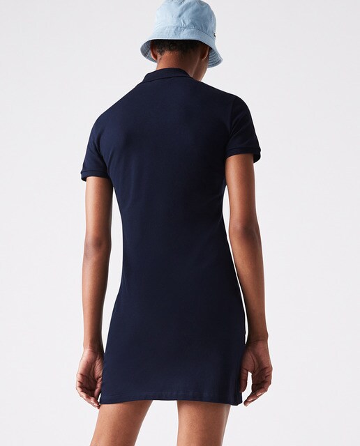 Vestido polo en piqué de algodón stretch, manga corta y cuello polo  acanalado con cuatro botones. · Lacoste · El Corte Inglés