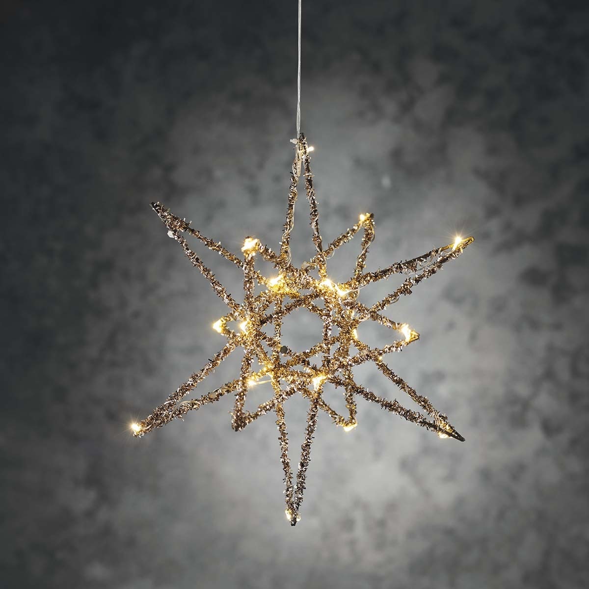 Estrella espumillón dorada con 20 luces LED Navidad El Corte Inglés Oro-5