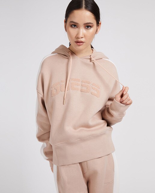 Sudadera de mujer lisa con capucha y escrito marca en parte frontal · Guess  · El Corte Inglés