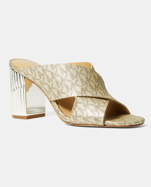 Sandalias de tacón de mujer en lona de color oro con estampado en logotipo  · Michael Michael Kors · El Corte Inglés