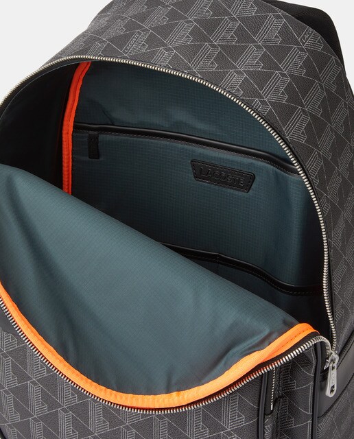 Mochila de color negro con cremallera y espacio para el portátil · Lacoste  · El Corte Inglés