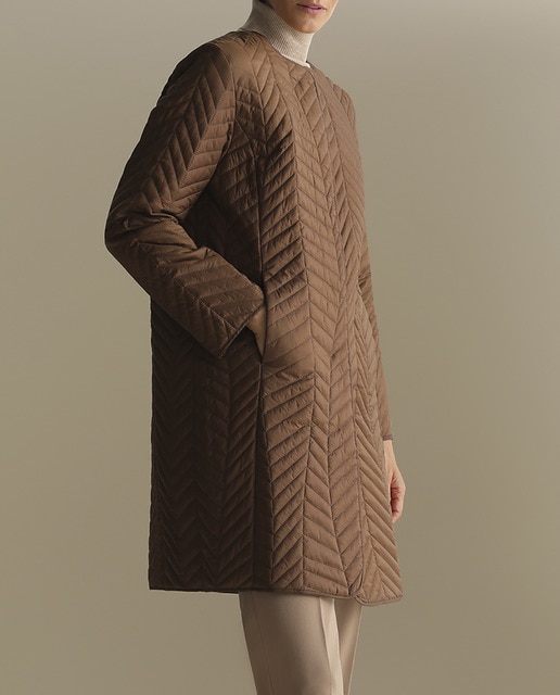 Imagen 0 de Parka guateada de mujer con bufanda