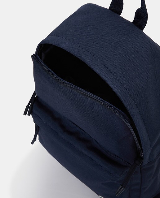 Mochila en azul marino con cremallera · Lacoste · El Corte Inglés