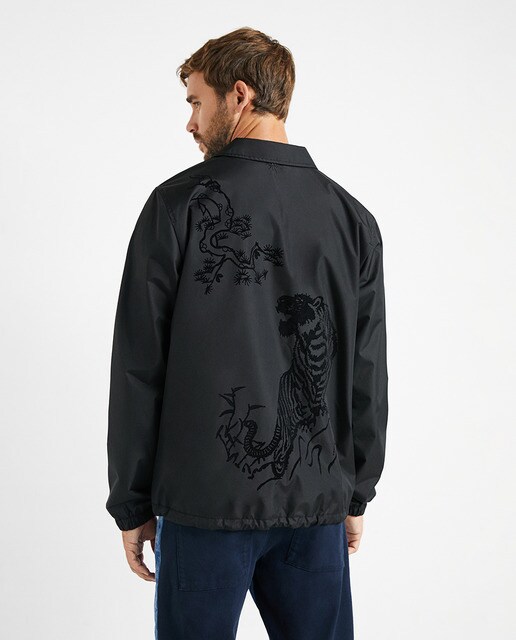 Chaqueta de hombre con capucha negra · Desigual · El Corte Inglés
