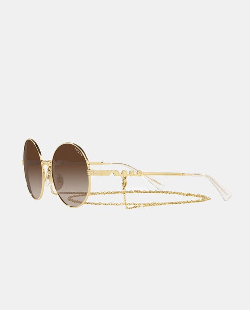 Gafas de sol redondas de metal dorado · Vogue · El Corte Inglés