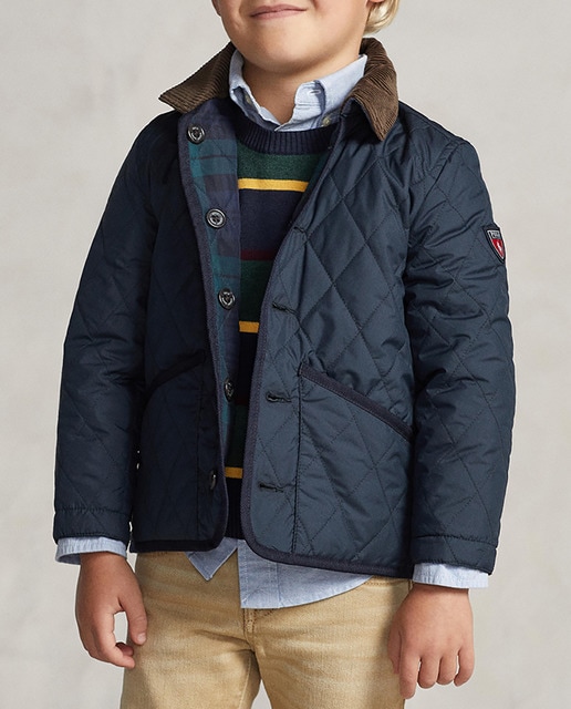 Imagen 0 de Husky de niño reversible azul marino cuadros