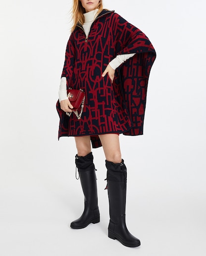 Imagen 0 de Capa de mujer de cuello alto con cremallera