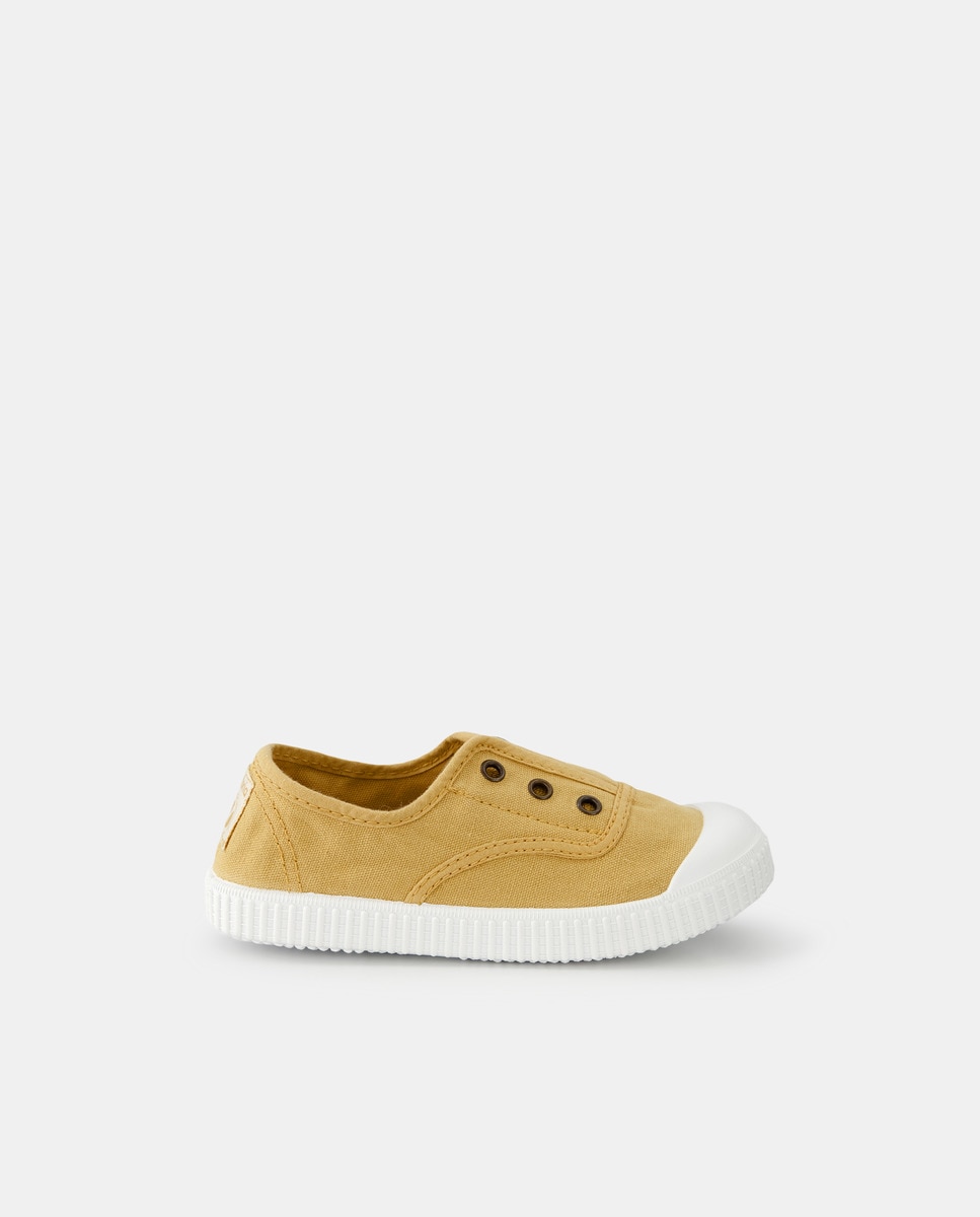 Chaussures en toile basses à semelle cuvette, bout renforcé et fermeture élastique