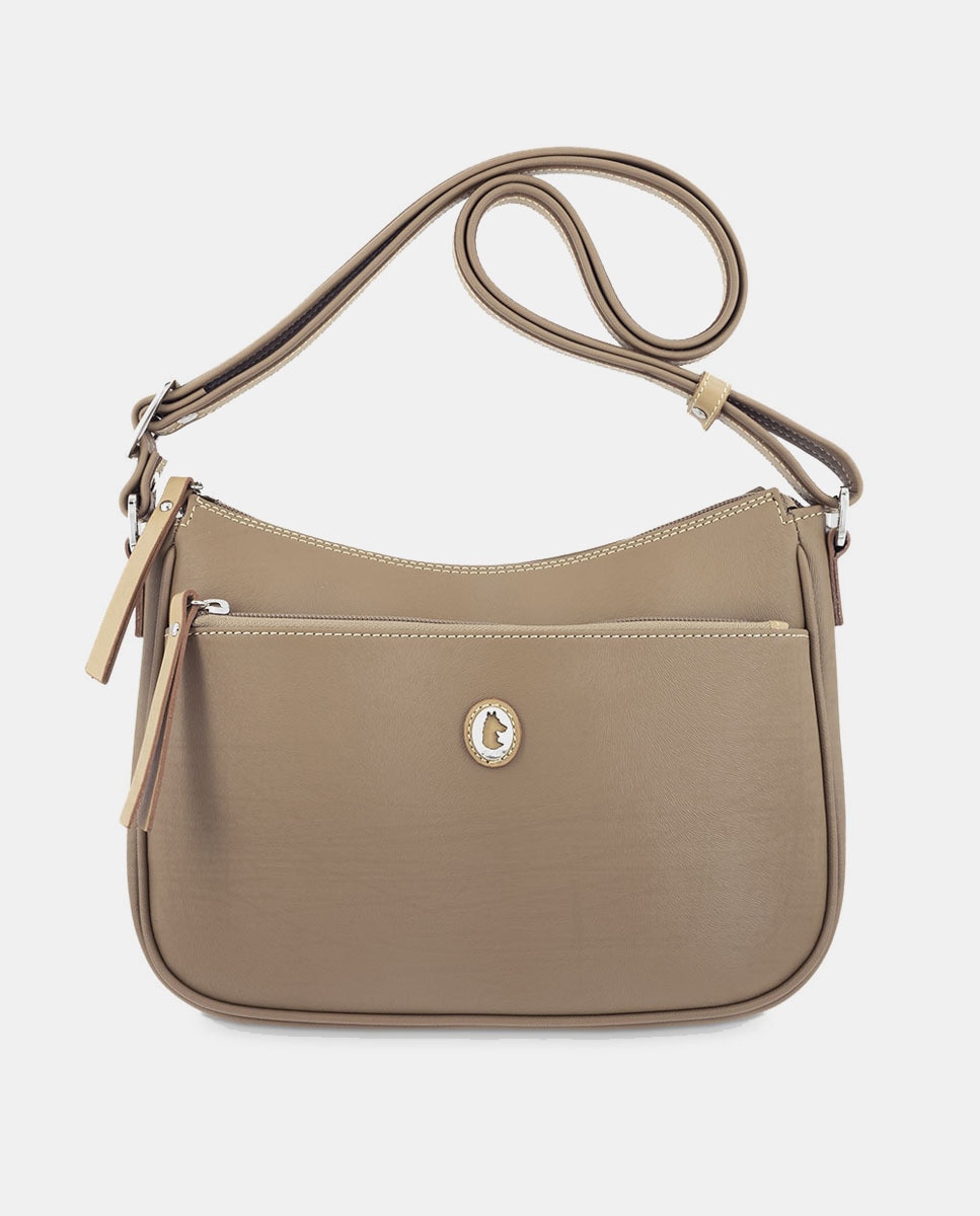 Sac à bandoulière avec trois poches extérieures et fermeture zippée