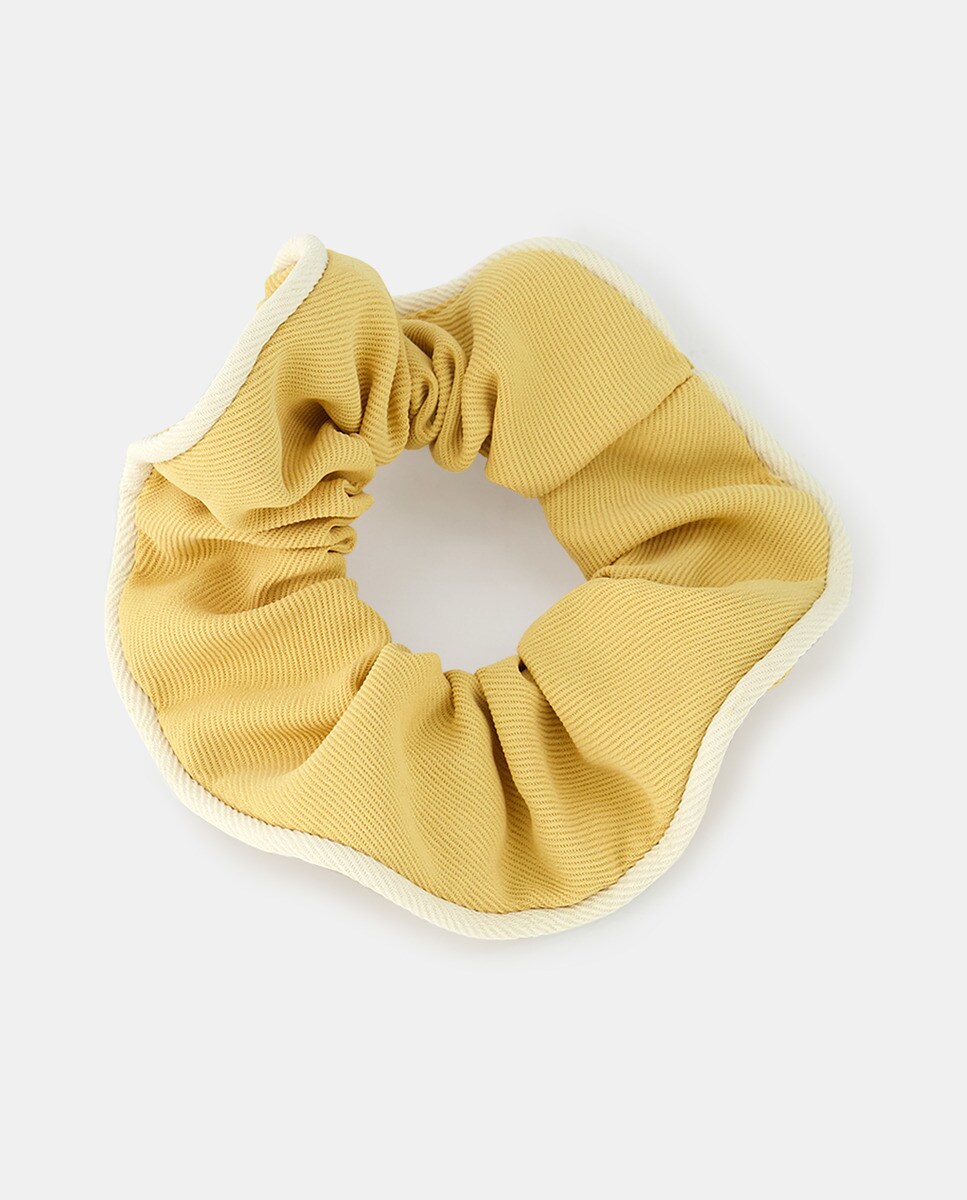 Coletero fru fru con ribete en amarillo · Siena · El Corte Inglés