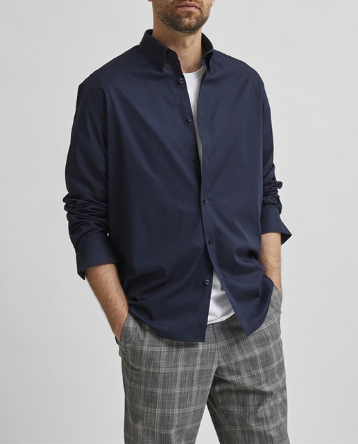 Imagen 0 de Camisa de vestir de hombre regular lisa