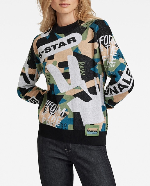 Imagen 0 de Jersey de punto de mujer de jacquard tejido en un diseño gráfico multicolor