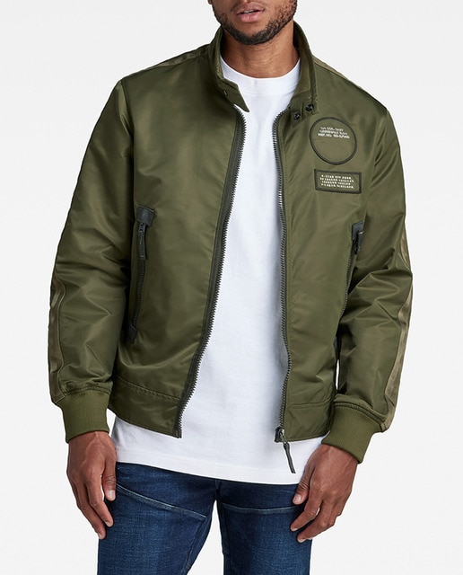 Imagen 0 de Chaqueta de hombre de corte ligero con el cuello alzado y dos botones a presión