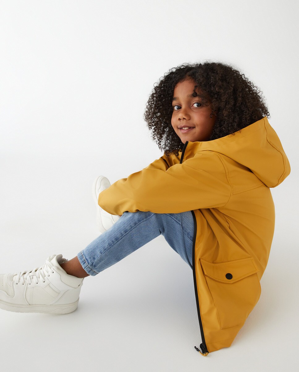 Parka enduite avec deux poches