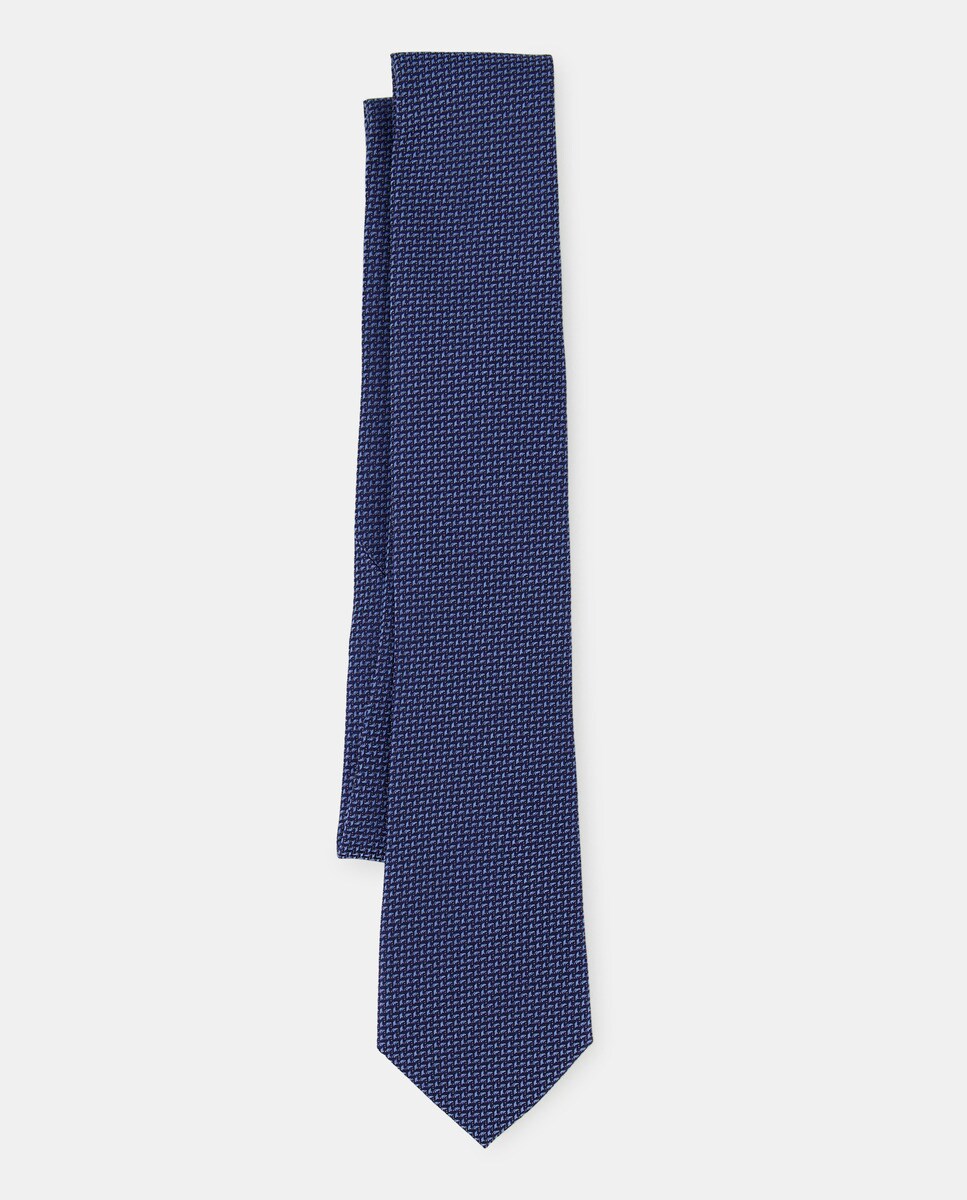 Cravate en soie naturelle.